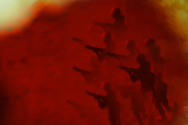 istock Toy soldiers on the bloody background 1410135534