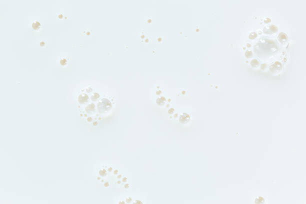 istock Macro milk,White surface of milk and bubbles and ripples from above birds eye view,Bubbles on milk surface 1410136698