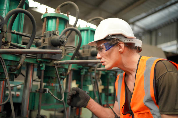 istock industrial background of caucasian mechanics engineer operating lathe machine for metalwork in metal work factory 1410137201