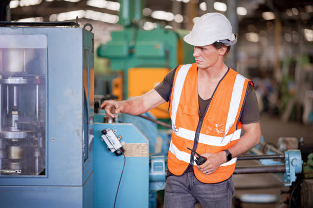 istock industrial background of caucasian mechanics engineer operating lathe machine for metalwork in metal work factory 1410137814