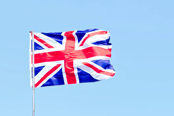 istock Union Jack flag suspended high in sky 1410141800