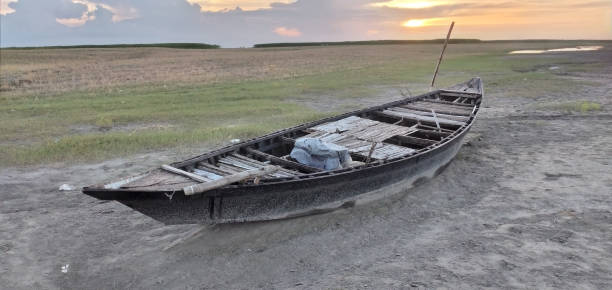 istock boat in the sunset time 1410141915