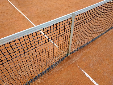 Green tennis court with net