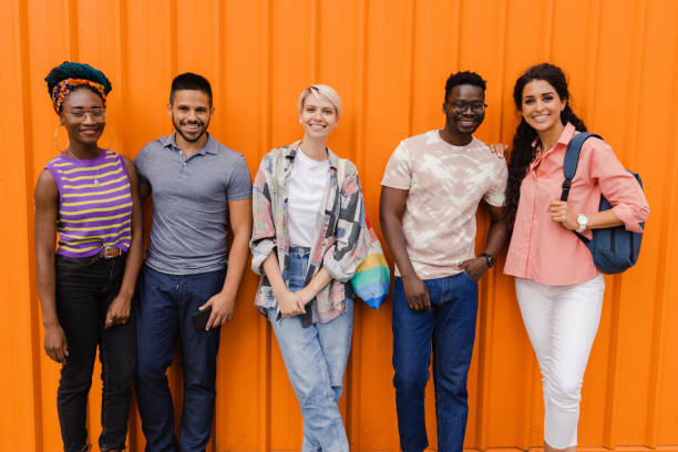 istock Young and diverse group of people standing together 1410143363