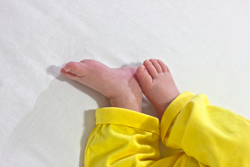 Defocus of newborn's feet soft