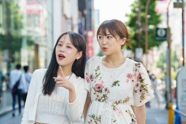 istock A woman shopping with friends in the city 1410144708