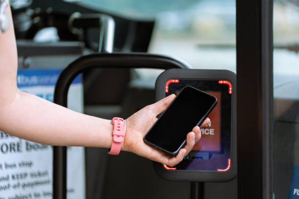 istock Person making a payment at a public transport using a cellphone 1410145067