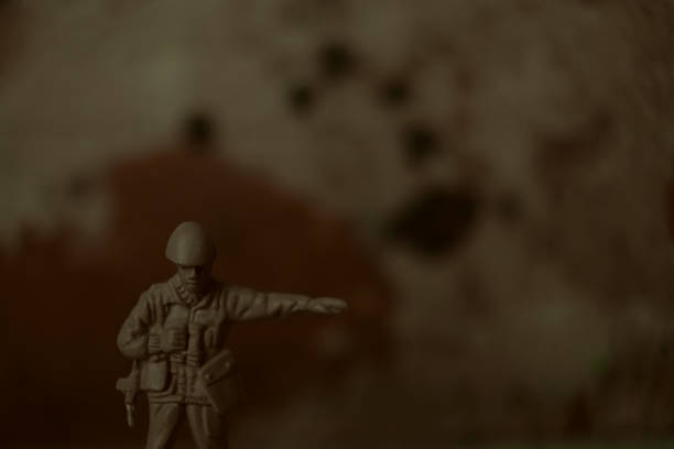 istock Toy soldier on the splattered background 1410147899