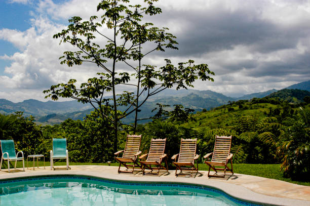 Beautiful pool and resort in the Costa Rican rainforest. stock photo