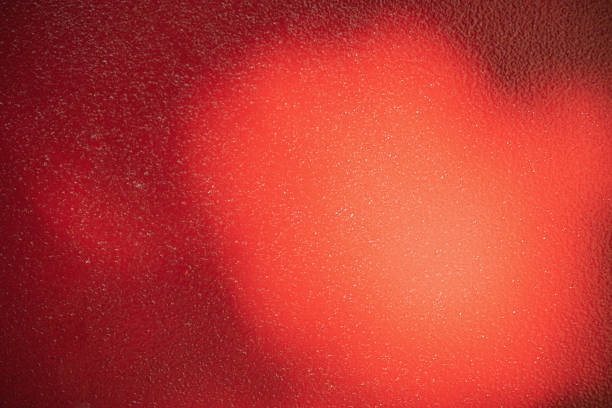 istock Red metal background. Light and shadow painted with red paint metal texture. 1410156731