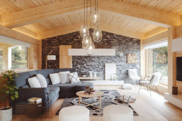 Modern European alpine chalet interior Modern European alpine chalet interior. This is 3D generated image. Book cover is my own image. modern cottage interior design stock pictures, royalty-free photos & images