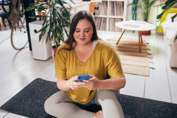 istock Woman Texting On Smartphone 1410160583