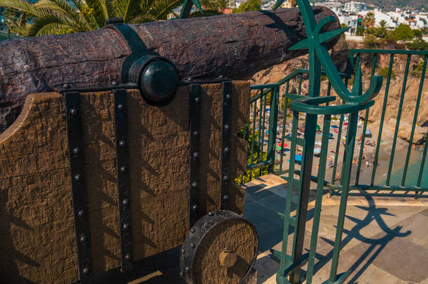 View of old Spanish war cannon facing Nerja beach.