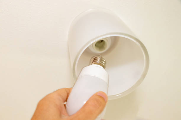 istock Replace the light bulb of the lighting fixture 1410167458