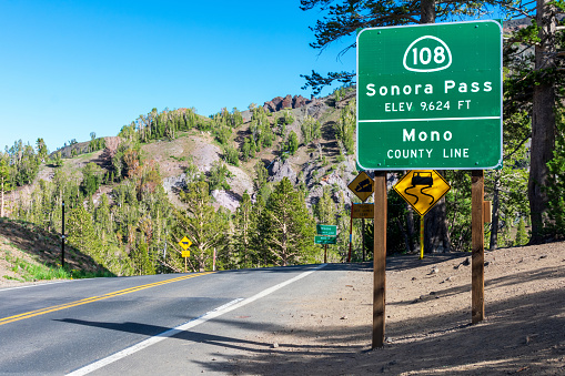 Sonora Pass, elevation 9,624 feet sign on scenic highway 108 in California.
