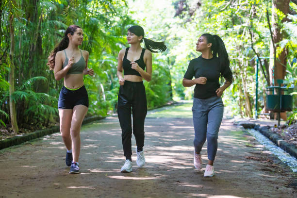 istock Three women in sportswear running 1410178911