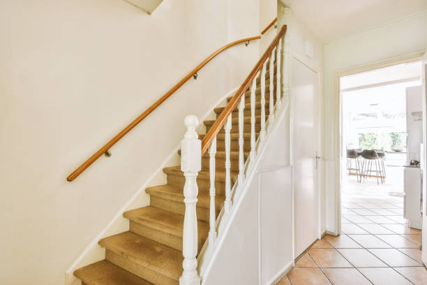istock Spacious corridor leading to the living room and a side staircase 1410184557