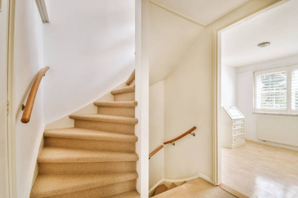 istock Spacious corridor leading to the small room and a side staircase 1410184573