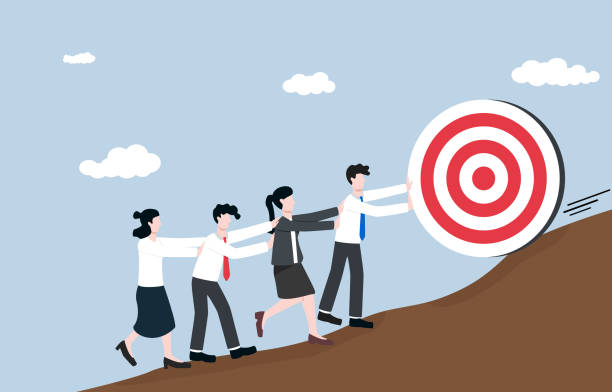istock Team effort to win difficult business target or challenge, motivation and encouragement from colleague to complete work concept. Teammates helping together to push target up top of mountain. 1410184924