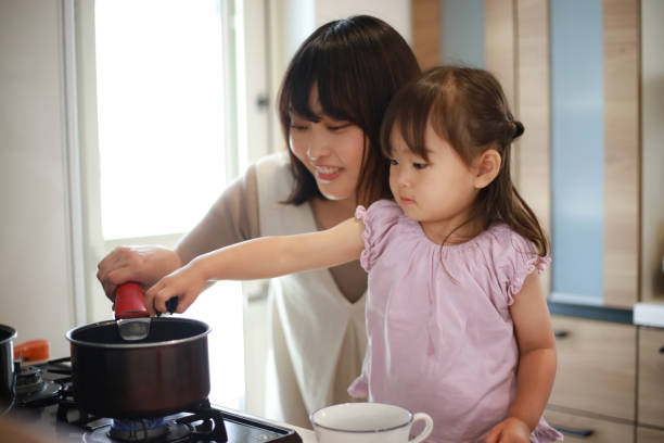 istock Parent and child cooking 1410191289