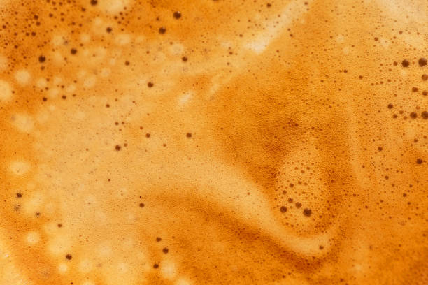 Coffee foam texture The texture of coffee foam is brown with bubbles. texture cafe stock pictures, royalty-free photos & images