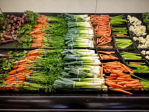 fresh Vegetables are set out for sale at this grocery store