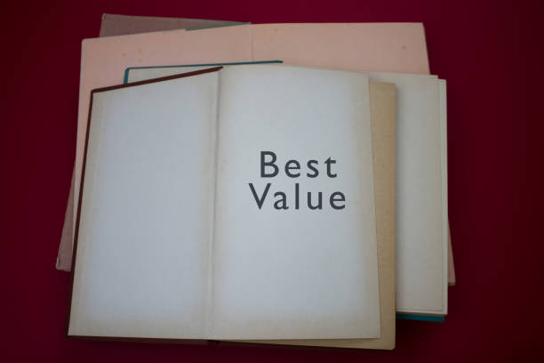 istock Best Value word in opened book with vintage, natural patterns old antique paper design. 1410203128