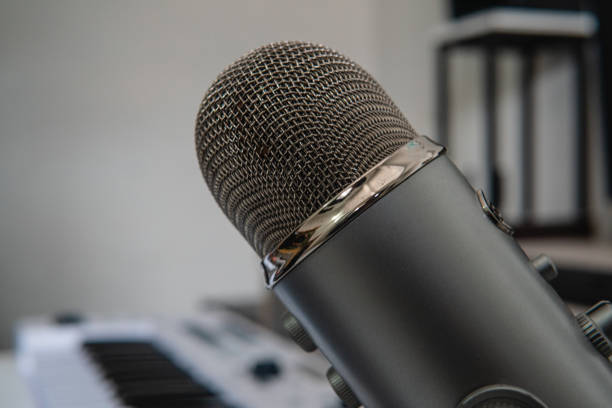 istock Close up of a microphone in a professional music studio. Professional microphone. 1410203991