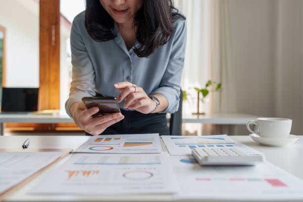 istock Young business woman completes KYC using an online banking program in order to open a digital savings account. The definition of cyber security. 1410204136
