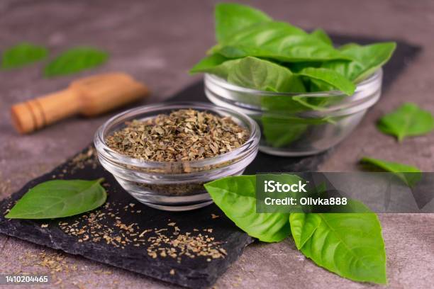 Fresh Bezel Leaves And Dried Basil On A Black Board Stock Photo - Download Image Now