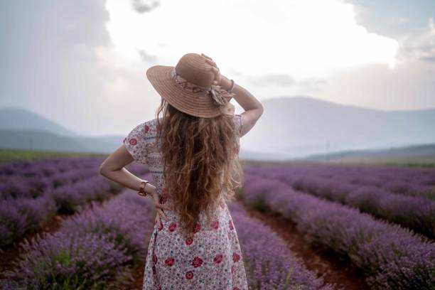 istock Young woman at a lavender field 1410211387