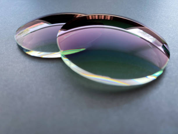 istock Two green gradient sun protection plastic eyeglass lens on Black background. 1410211638