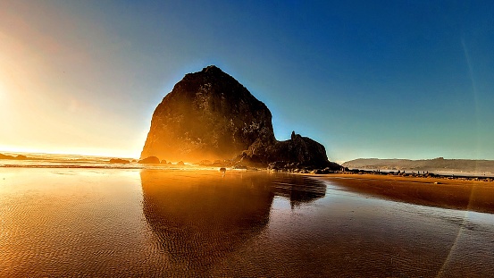 Traveling across Oregon, you'll see hidden gems such as Haystack Rock at Cannon Beach, which is a beautiful unique ecosystem.