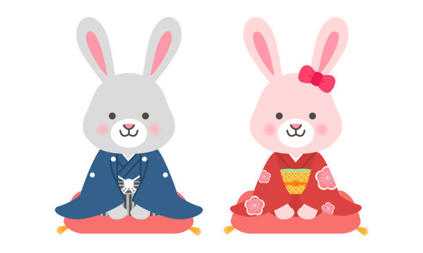 New Year's Day Clip Arts and Crafts Illustration: Pair of rabbits in kimono sitting on cushions New Year's Day Clip Arts and Crafts Illustration: Pair of rabbits in kimono sitting on cushions zabuton stock illustrations