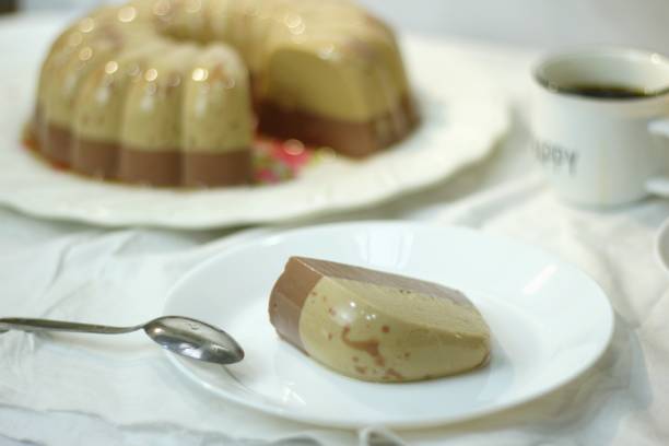 istock horlicks pudding slices on white plate. delicious dessert made from horlicks pudding and chocolate pudding. 1410225015