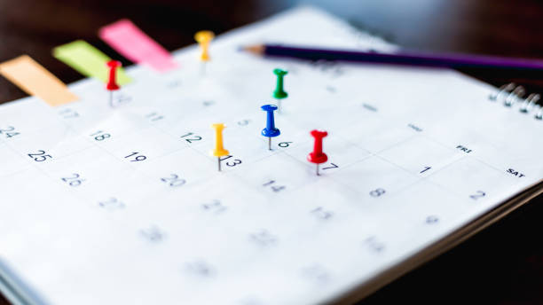 Calendar and scheduled appointments with pins. stock photo