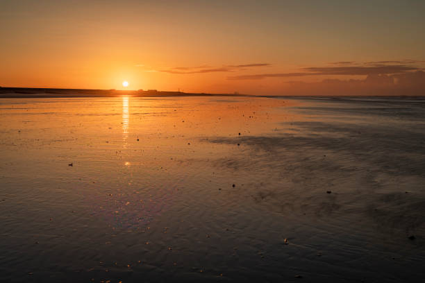 istock Camber Sands Sunrise 1410225651