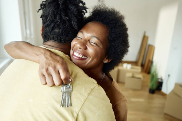 istock Celebrating new home keys with a hug! 1410226853