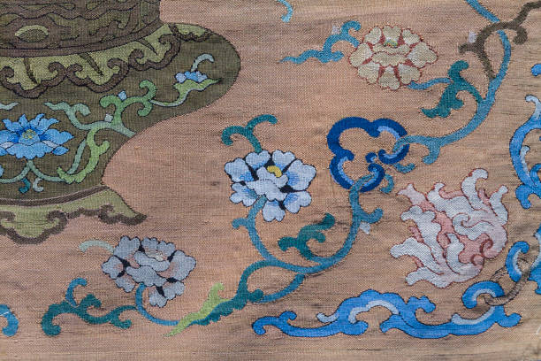 Colorful dpraped tulle fabric isolated over white closeup