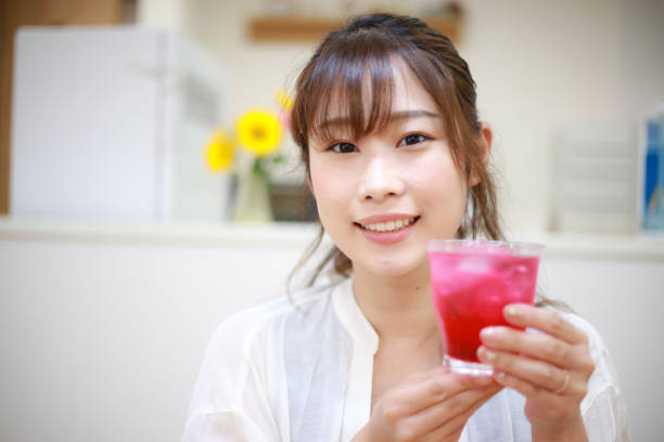 Woman with shiso juice