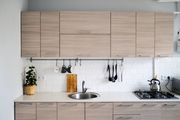 istock Scandinavian-style kitchen with wood-like facades 1410229872