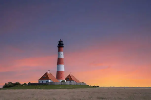 Panoramic image of Westerhever lighthouse against sky, North Frisia, Germany