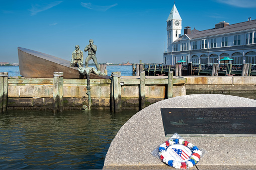 Manhattan, New York City - May 31, 2022 - In Battery Park, there are The American Merchant Mariners’ Memorial.  It’s a major sculptural work by Marisol Escobar