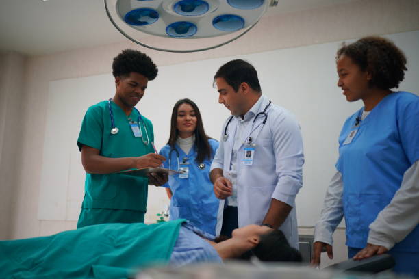 istock Medical Team Working On Patient In Emergency Room 1410233237