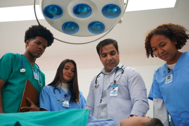 istock Medical Team Working On Patient In Emergency Room 1410234269