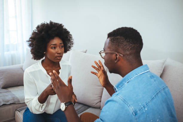 istock Depressed husband quarreling with wife, having serious relations communication problems. 1410235551