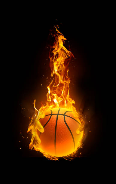 istock basketball, fire in hand black background 1410238575