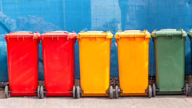 istock Garbage Plastic Bins Red Yellow Green Colors 1410242900