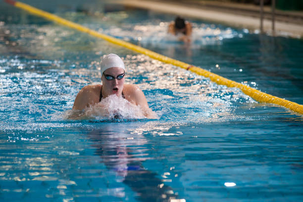 istock Female swimmer -  breaststroke style 1410243508