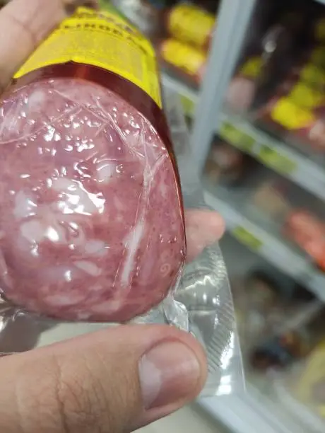 Photo of Worm helminth in sausage